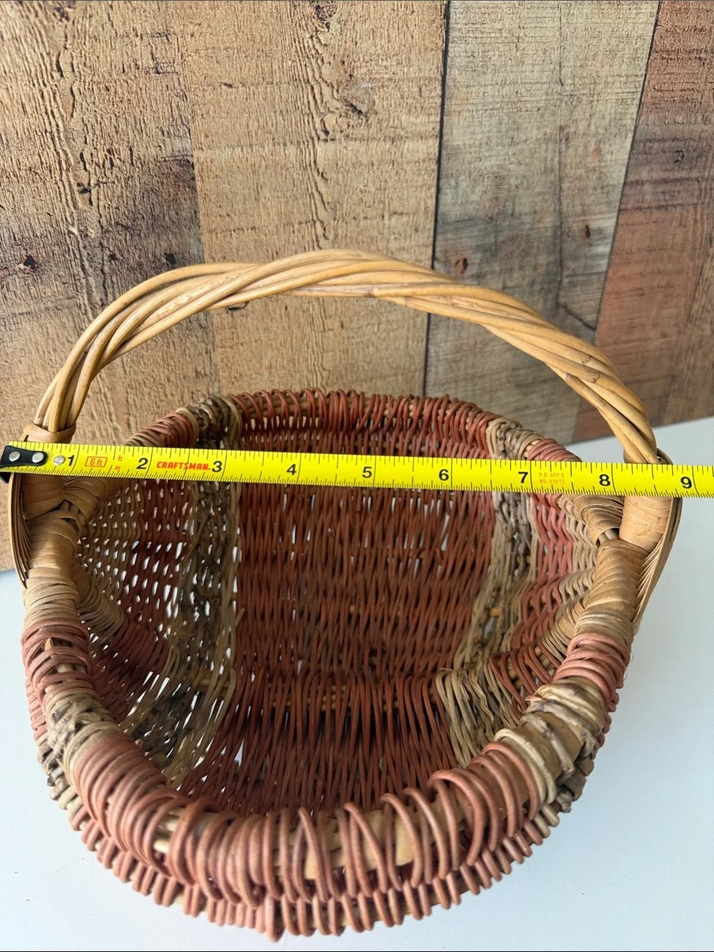 Vintage Primitive Woven Buttocks Basket with God’s Eye in Natural and Terracotta